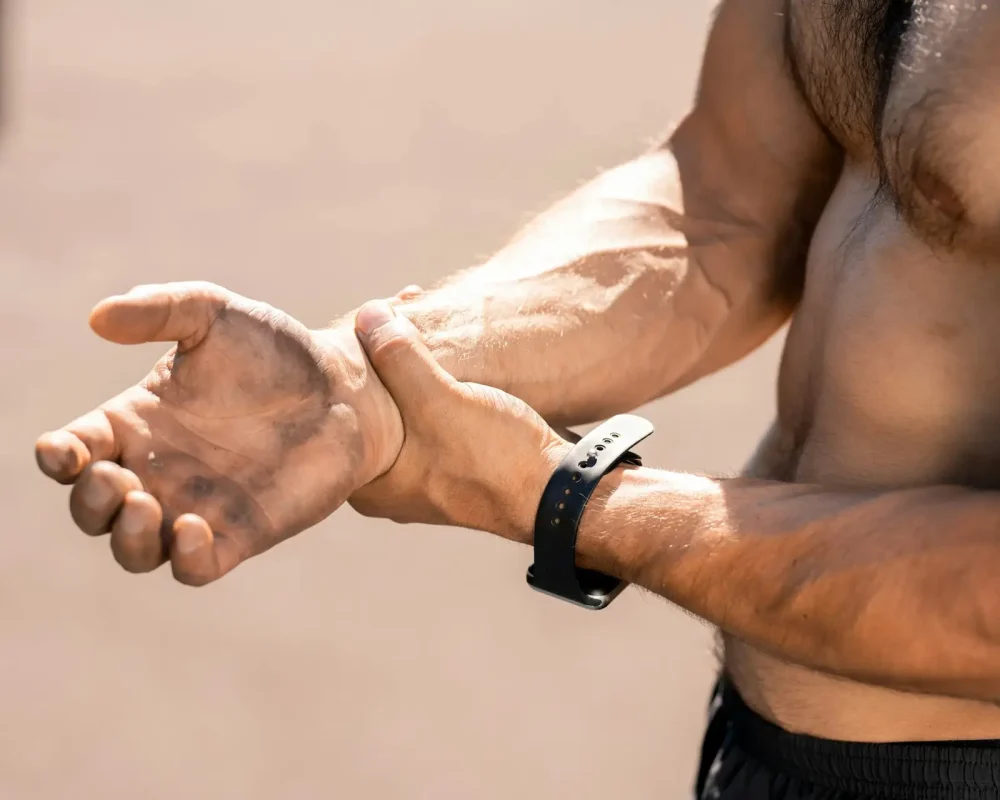 Massaging hurt wrist